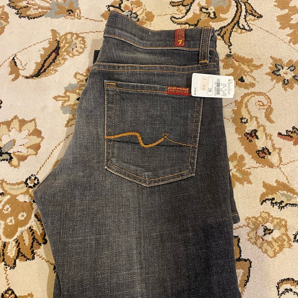 UNUSED/ distressed charcoal black bootcut jeans.